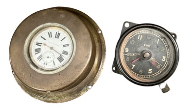 Lot 712 - Second World War RAF cockpit clock with 8 day movement in bakelite case with Air Ministry stamp to rear of case, together with a pocket watch in brass travelling case, (2).