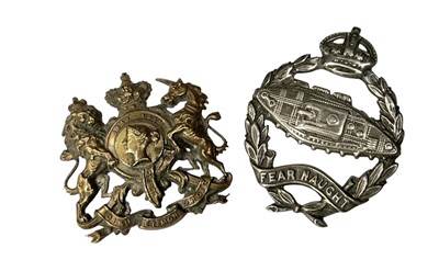 Lot 749 - 1920s Royal Tank Regiment officer's silver cap badge (Birmingham 1925) and Victorian badge (2).