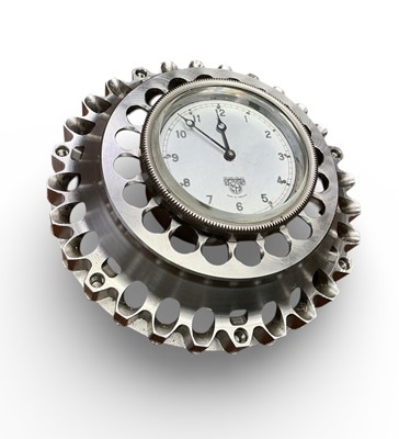 Lot 91 - Smiths car clock in metal case, the case 17cm in diameter.