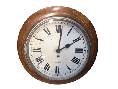 Lot 2922 - 20th century oak cased post office style wall clock, retailed by Gar...