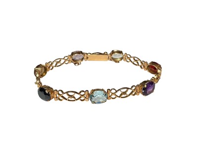Lot 15 - Yellow metal multi-gem set bracelet