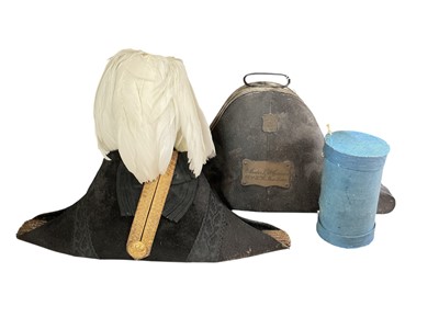 Lot 758 - Victorian bicorn hat with 23rd Welch Fusiliers button, in original japanned helmer tin with engraved name plaque.