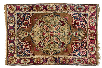 Lot 1489 - Arts and crafts style rug with foliate ornament