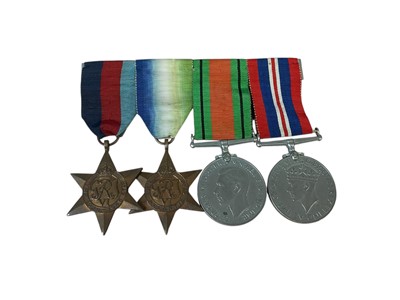 Lot 1 - Second World War medal group comprising 1939 - 1945 Star, Atlantic Star, Defence and War medals (mounted on bar).