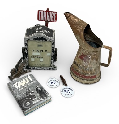 Lot 128 - Mobil oils pouring jug, together with a Pegasus mascot and Chelmsford city taxi meter and identity badges.