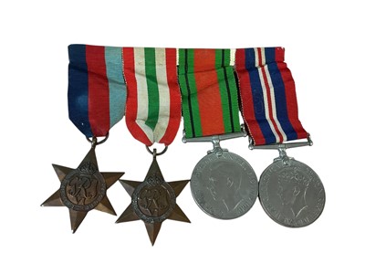 Lot 10 - Second World War medal group comprising 1939 - 1945 Star, Italy Star, Defence and War medals (mounted on bar).