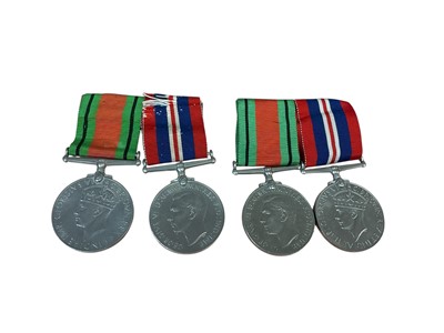 Lot 12 - Second World War medal pair comprising Defence and War medals, together with another matching pair (both pairs mounted on bar).