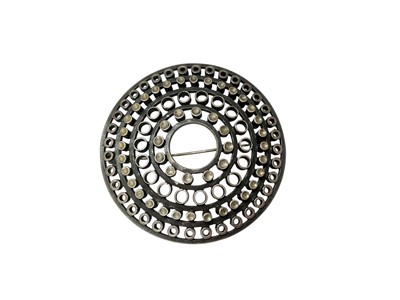 Lot 1 - 1960s Marianne Berg for David Andersen Norwegian silver modernist circular brooch