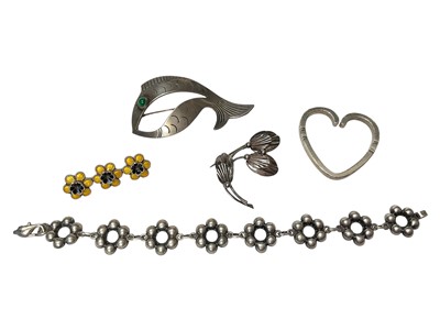 Lot 4 - Group of Danish silver jewellery to include Georg Jensen heart pendant / keyring, no. 44, Nefrom fish brooch, stylised floral spray brooch, yellow enamel triple flower head bar brooch and a flowe...