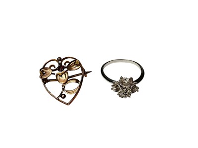 Lot 7 - 9ct gold gem set floral heart shaped brooch and a Continental cluster dress ring