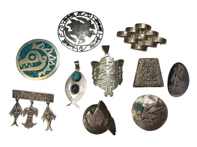 Lot 10 - Group of South American, Mexican and similar style silver and white metal brooches and pendants