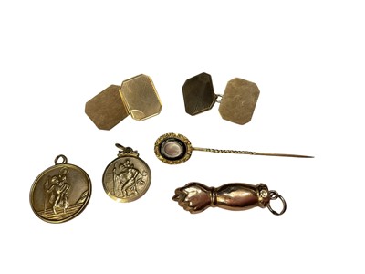 Lot 26 - Pair of 9ct gold cufflinks, two 9ct gold St. Christopher pendants, Victorian yellow metal and enamel glazed mourning stick pin and a yellow metal clenched fist pendant