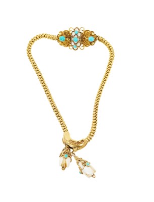 Lot 475 - Victorian yellow metal bracelet with snake links, turquoise cabochons and carved ivory terminals