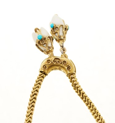 Lot 475 - Victorian yellow metal bracelet with snake links, turquoise cabochons and carved ivory terminals