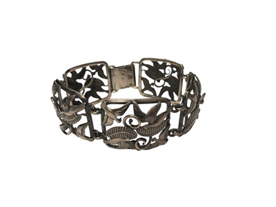 Lot 34 - Vintage Danish silver bracelet by Chr. Veilskov, with five large panels depicting flying birds, leaves and scrolls