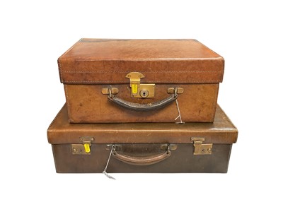Lot 5144 - Two vintage brown leather dressing cases