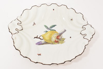 Lot 109 - Chelsea style ‘silver shape’ dish, decorated with a cut lemon