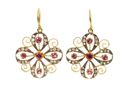 Lot 547 - Pair of Victorian style ruby and diamond pierced rosette shaped earrings