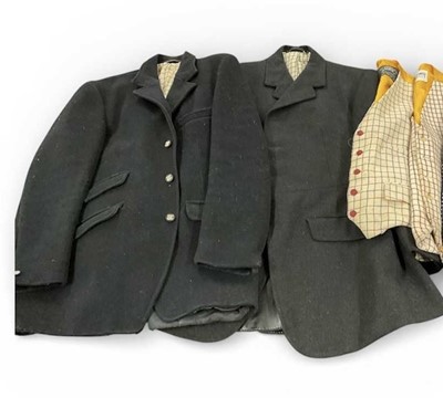 Lot 917 - Gentleman's black hunt coat with Essex Hunt buttons, by Matlock & Brown, another black Moss Bros hunt coat and two tattersall waistcoats (4)