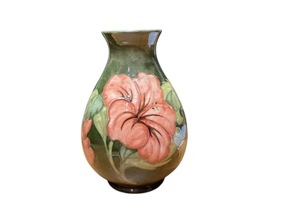 Lot 2201 - Moorcroft pottery vase decorated in the Hibiscus pattern