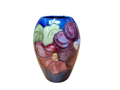 Lot 2202 - Moorcroft pottery vase decorated in the Peony pattern
