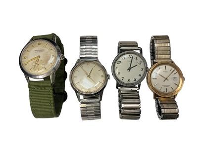 Lot 168 - 1960s Mavado automatic wristwatch in stainless steel case and military canvas strap and three other vintage wristwatches (4)