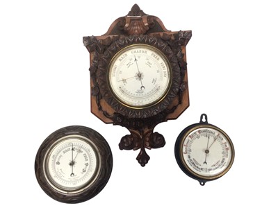 Lot 2942 - Late Victorian aneroid barometer thermometer in attractive carved walnut case and two others (3)