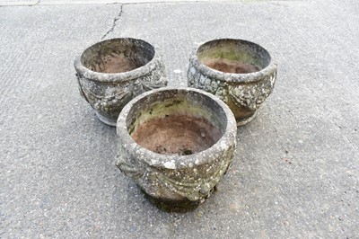 Lot 1464 - Set of three Grecian style garden urns