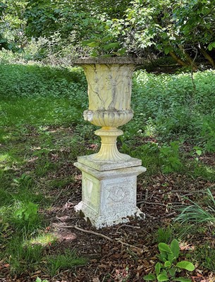 Lot 1475 - Large classical urn on stand, moulded with figures