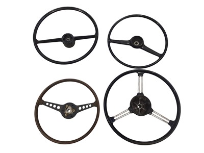 Lot 61 - Group of four various classic car steering wheels (4).
