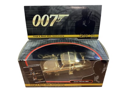Lot 1823 - Corgi (c2005) Bond 40th Anniversary diecast 1:36 scale gold version Goldfinger Aston Martin DB5, CCO4307 and Die Another Day Aston Martin V12 Vanquish, CC07505, plus seven other 007 movie diecas...