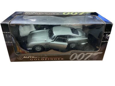 Lot 1826 - Auto Art The James Bond Collection 1:18 scale 007 Collectors diecast model Goldfinger Aston Martin DB5 (solid roof version), The World is not Enough BMW Z3 and You Only Live Twice Toyota 2000GT,...