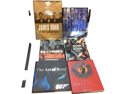 Lot 1115 - Selection of James Bond 007 reference books and Souvenir Stamp Pack (1 box)