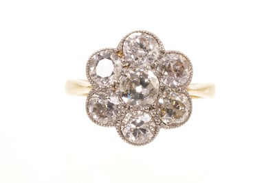 Lot 449 - Edwardian diamond cluster ring with seven old cut diamonds estimated to weigh approximately 2.10cts in total.