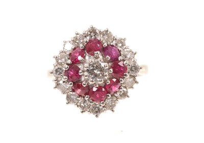Lot 453 - Ruby and diamond cluster cocktail ring