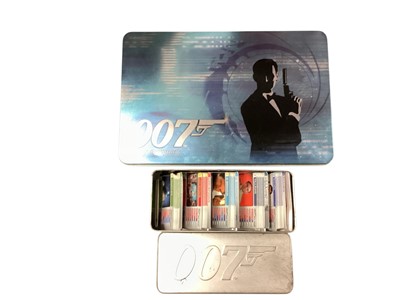 Lot 1119 - James Bond 007 Spy Cards & Spy Files Cards, both in presentation tins, Magazines, Post Cards & framed 007 Picture (1 Box)