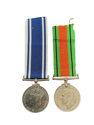 Lot 160 - George VI Police Long Service and Good Conduct medal named to Const. Joseph. A. N. Taylor, together with a Second World War Defence medal and his certificate of Service.