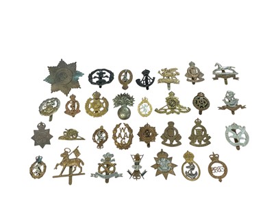 Lot 166 - Collection of approximately thirty British Military cap badges to include Durham Light Infantry and Royal Corps of Signals, (30).