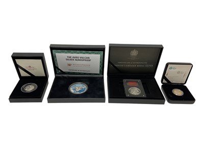 Lot 462 - World - Mixed silver coins & medallions to include The Longest Reigning Monarch two Crown set 1977, Waterloo 200 years commemorative medallion 2015, Vulcan Bomber proof 2oz commemorative med...