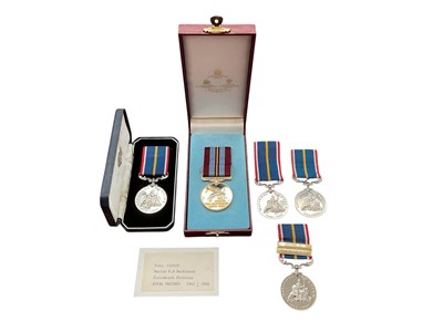 Lot 185 - Four unofficial National Service medals, one with box of issue, together with an Arnhem 50th Anniversary medal, (5).
