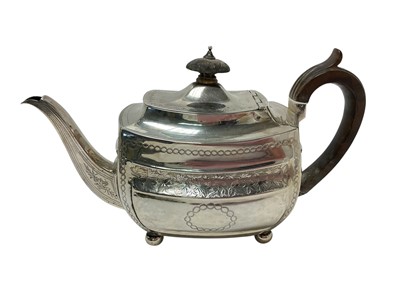 Lot 243 - George III silver teapot with fruitwood handle (London 1806)