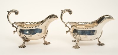 Lot 244 - Pair of George III silver sauce boats (London 1764)