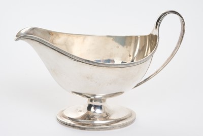 Lot 245 - George III silver sauce boat with reeded border (London 1800)