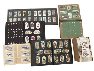Lot 1196 - Extensive collection of cigarette cards, some in albums and some loose (1 box)