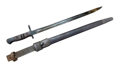 Lot 901 - First World War 1913 pattern Remington bayonet, in steel mounted leather scabbard with leather frog.