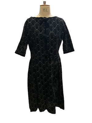 Lot 2505 - 1950s / 60s Christian Dior Modele Original black devoré velvet cocktail dress with low back and bow details.