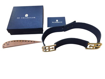 Lot 113 - 1990's Bugatti EB collection leather luggage strap with EB branded buckles, together with a wooden paper knife / letter opener, in an EB collection box with papers.