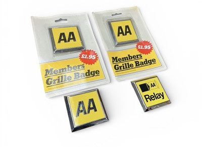 Lot 165 - Two unused AA members badges with original packaging, together with an AA Relay badge and one other AA badge, (4).
