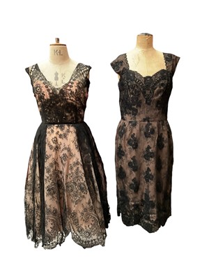 Lot 2512 - Four 1950s strapless lace dresses with boned bodices, full stiffened underskirts.