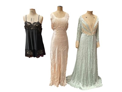 Lot 2513 - A box of vintage silk and satin lingerie with lace trims including petticoats, nighties, bed jackets, dressing gown etc.